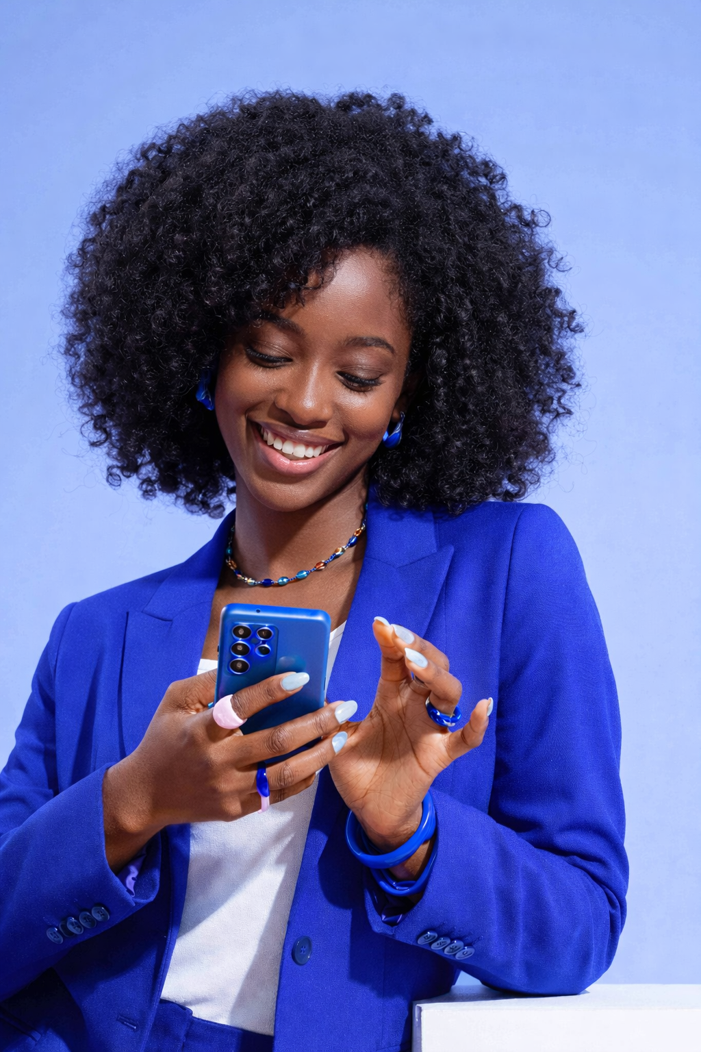 A Nigerian shop owner using SyncSalez behind the counter